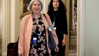 Anita Dunn (L), senior advisor to President Joe Biden, and White House Deputy Director of Legislative Affairs Reema Dodin arrive for a lunch meeting with Senate Democrats at the U.S. Capitol on July 22, 2021 in Washington, DC.