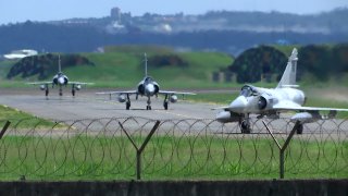 Taiwan Air Force Mirage fighter jets taxi on a runway at an airbase in Hsinchu, Taiwan, Friday, Aug. 5, 2022.