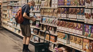 A man shops at a supermarket