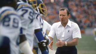 Head coach Don Coryell of the San Diego Charger talks with his players on the sidelines against the Tampa Bay Buccaneers during an NFL football game Dec.13, 1981, at Tampa Stadium in Tampa Bay, Florida.