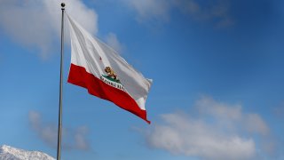 The California state flag are seen before the Monster Energy NASCAR Cup Series Auto Club 400 at Auto Club Speedway.