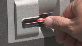 CARD GOES INTO ATM