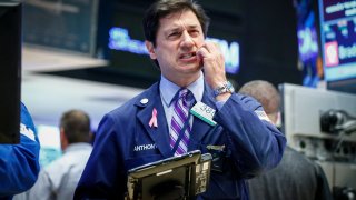 A trader works on the floor of the New York Stock Exchange (NYSE).