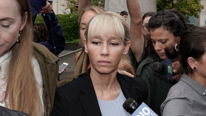 Sherri Papini leaves the federal courthouse after Federal Judge William Shubb sentenced her to 18 months in federal prison, in Sacramento, Calif., Monday, Sept. 19, 2022.