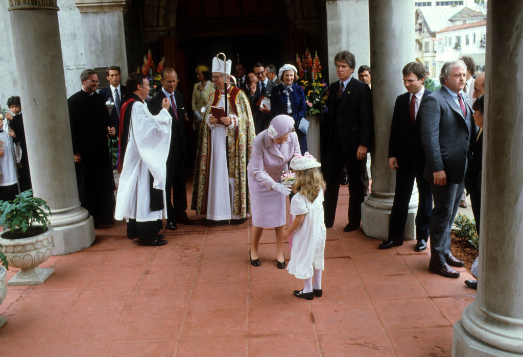 Alleyn Davis presenting Queen Elizabeth II with bouquet after services at St, Paul's church, San Diego, California, 1st March 1983.