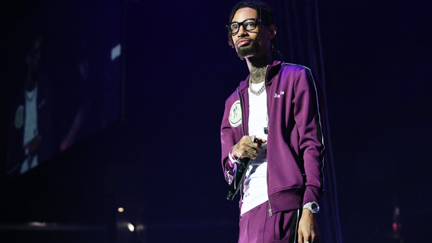 PnB Rock performs onstage at the STAPLES Center.