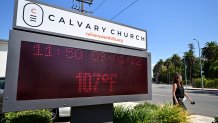 The temperature reads 107 degrees Farenheit (41 degrees Celsius) before noon on an electronic sign borad at the Calvary Church in West Hills, California on September 1, 2022. - A late summer heatwave is triggering triple-digit temperatures across much of Southern California while testing the state's electricity power grid. (Photo by Frederic J. BROWN / AFP) (Photo by FREDERIC J. BROWN/AFP via Getty Images)