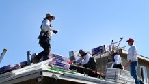 Lakewood, CA - September 02: Installing a roof is hard work, during a heatwave safety is crucial, at a house in Lakewood on Friday, September 2, 2022. Richard Crowell, the owner of RC Roofing takes heat seriously, encouraging his crew to stay covered and hydrated while working under the hot sun. (Photo by Brittany Murray/MediaNews Group/Long Beach Press-Telegram via Getty Images)