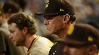 PHOENIX, ARIZONA – SEPTEMBER 15: Manager Bob Melvin #3 of the San Diego Padres looks on from the dugout against the Arizona Diamondbacks during the fifth inning at Chase Field on September 15, 2022 in Phoenix, Arizona. (Photo by Norm Hall/Getty Images)