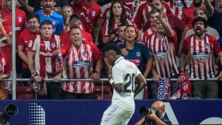 Real Madrid’s Vinicius Junior celebrates the opening goal during the Spanish La Liga soccer match between Atletico Madrid and Real Madrid at the Wanda Metropolitano stadium in Madrid, Spain, on Sept. 18, 2022.