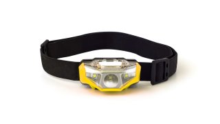 Headlamp with elastic strap isolated on white background, taken on an unknown date.