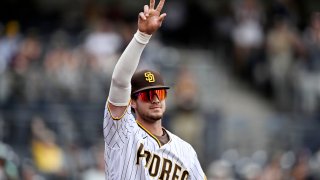 SAN DIEGO, CA – OCTOBER 5: Wil Myers #5 of the San Diego Padres acknowledges the crowd as he leaves the game during the eighth inning of a baseball game against the San Francisco Giants October 5, 2022 at Petco Park in San Diego, California. (Photo by Denis Poroy/Getty Images)