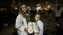 Ingrid Janssens-Lozano, 9, was gifted Joe Musgrove's cleats from the pitcher himself upon the San Diego Padres' return from their postseason run.