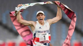 Joseph Choong of Britain crosses the finish line to win the men’s modern pentathlon at the 2020 Summer Olympics, Saturday, Aug. 7, 2021, in Tokyo, Japan.