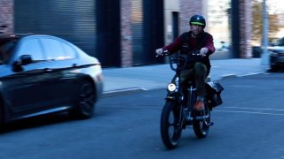 Rad Power Bike employee riding an e-bike.