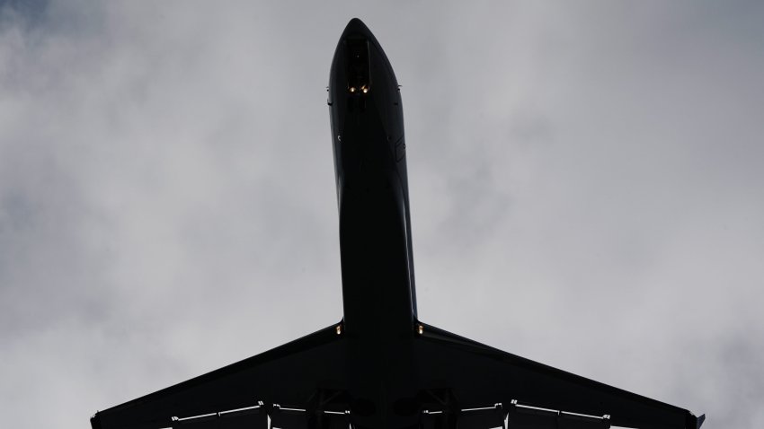 A Southwest 737-700 flies into the San Diego International Airport in 2020