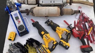 Catalytic converters and tools allegedly used for theft were found in a vehicle who led authorities on a pursuit from San Diego County to Orange County.