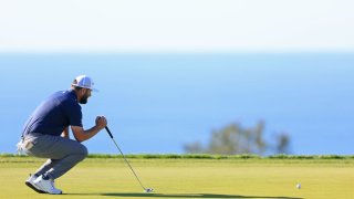 LA JOLLA, CALIFORNIA - JANUARY 27: Jon Rahm of Spain lines up a putt on the 14th green of the South Course during the third round of the Farmers Insurance Open at Torrey Pines Golf Course on January 27, 2023 in La Jolla, California. (Photo by Sean M. Haffey/Getty Images)