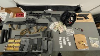 San Diego police found a cache of weapons, including unserialized ghost guns during a search in Pacific Beach in January 2023.