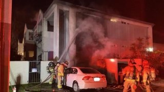 A fire tears through two apartment units in Imperial Beach on Feb. 4, 2023.