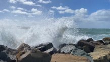 Waves crashing at a San Diego County Beach on Feb. 22, 2023.