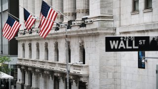 The New York Stock Exchange stands in lower Manhattan after global stocks fell as concerns mount that rising inflation will prompt central banks to tighten monetary policy on May 11, 2021 in New York City. By mid afternoon the tech-heavy Nasdaq Composite had lost 0.6% after falling 2.2% at its session low.