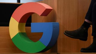 A Google sign is pictured during the company’s presentation of a detailed investment plan for Germany outside the Google office in Berlin, Germany, August 31, 2021.