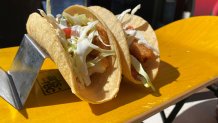 Beer-battered fish served with shredded cabbage, pico de gallo, chipotle sauce found at the Draft by Ballast Point in Section 105.