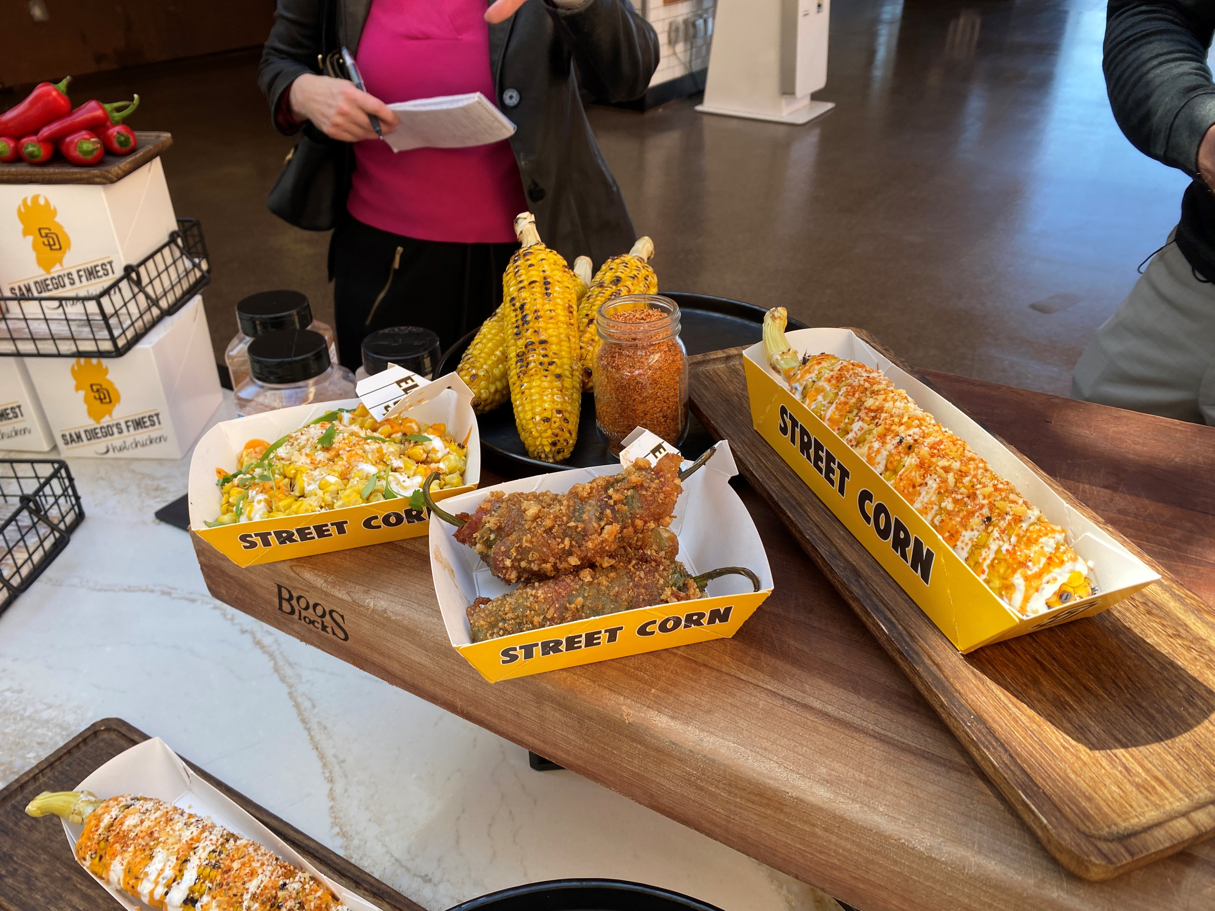 A new cart concept on the Main Concourse featuring authentic Elote on or off the cob. Found in Section 100.