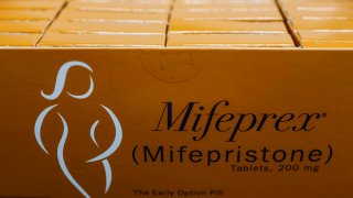 In this photo illustration, packages of Mifepristone tablets are displayed at a family planning clinic on April 13, 2023 in Rockville, Maryland.