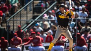 Jake Cronenworth #9 of the San Diego Padres stands at-bat during a spring training game against the Los Angeles Angels on March 24, 2023 at the Tempe Diablo Stadium in Tempe, Arizona.