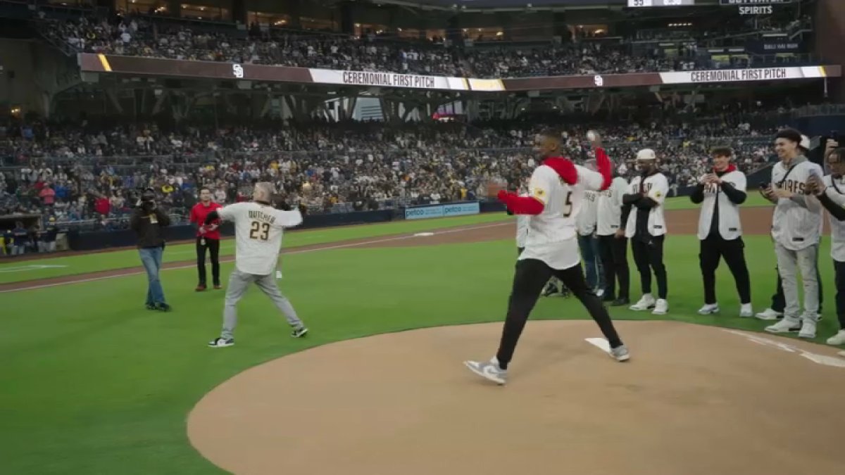 Lamont Butler, Coach Dutcher Throw First Pitch at Padres Game NBC 7