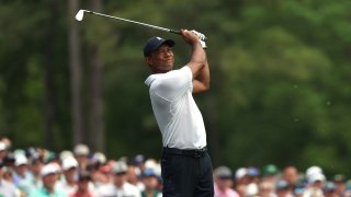 Tiger Woods of the United States plays his shot from the 12th tee during the first round of the 2023 Masters Tournament at Augusta National Golf Club on April 06, 2023 in Augusta, Georgia.