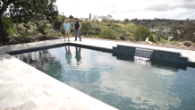 A finished pool in David Giles' backyard