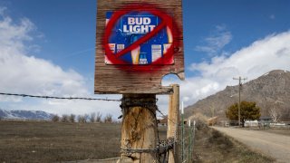 A sign disparaging Bud Light beer is seen along a country road on April 21, 2023 in Arco, Idaho.