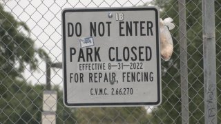 Sign on a chain link fence