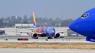 Southwest Airlines celebrated five years of airline service to Hawaii at the Long Beach Airport with a new plane painted to honor the islands of Hawaii, in Long Beach on Friday, April 28, 2023.