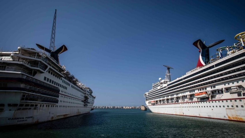 The Carnival Paradise cruise ship, operated by Carnival Corp., left, and the Carnival Sunshine cruise ship, operated by Carnival Corp., right, during servicing at the Navantia SA shipyard in Cadiz, Spain, on Tuesday, Sept. 28, 2021.