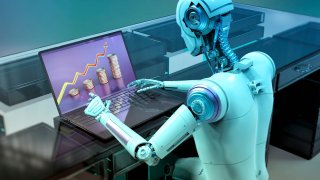 Humanoid robot working on laptop studying financial chart, conceptual computer illustration