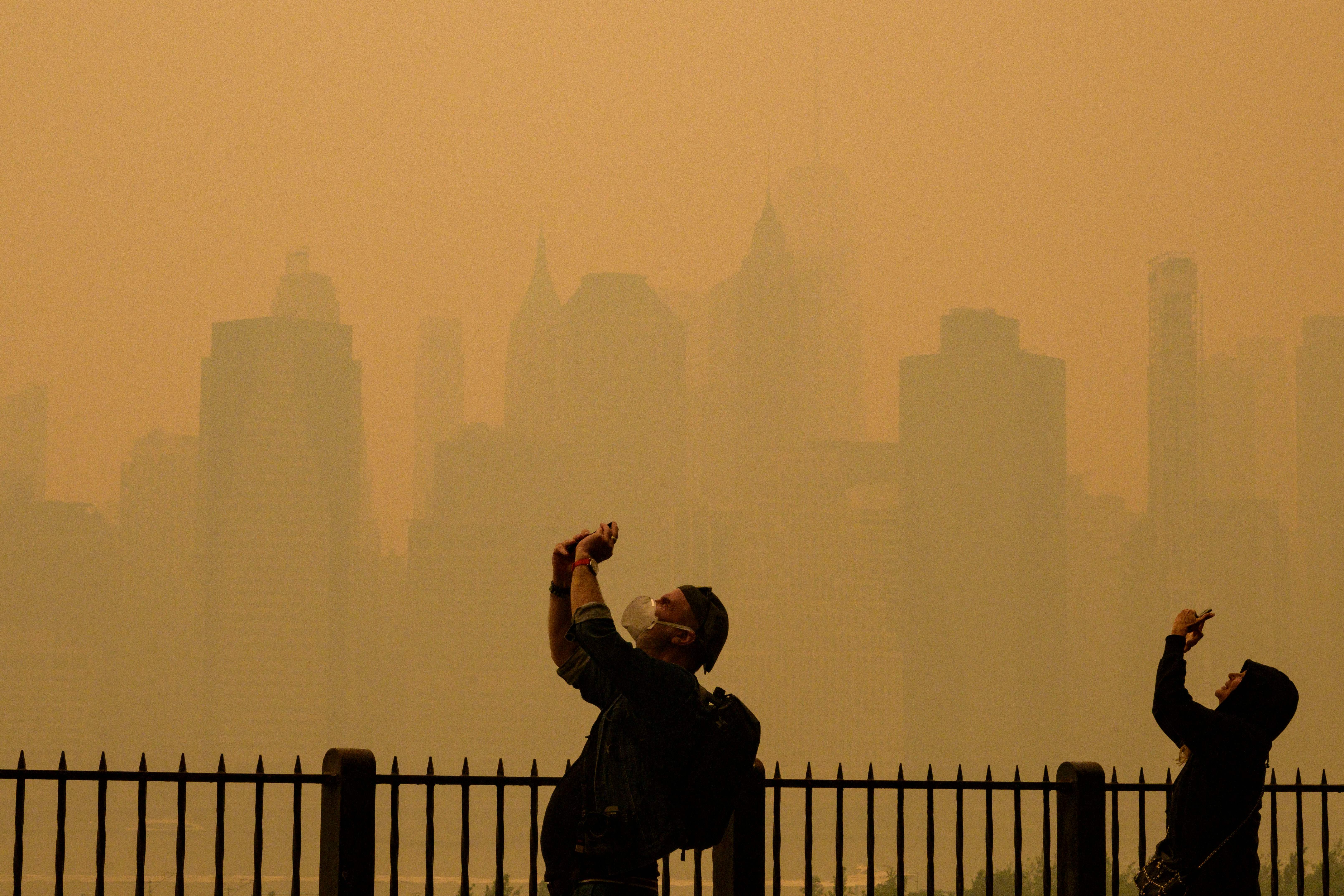 Wildfire smoke photos in NYC show ‘apocalyptic' sepia landscape