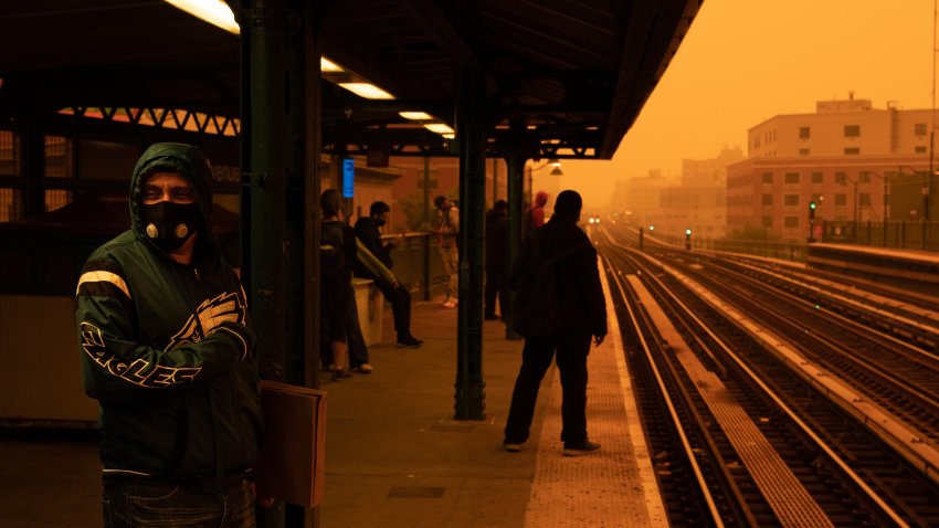 NEW YORK, NEW YORK – JUNE 7: A person waiting for the subway wears a filtered mask as smoky haze from wildfires in Canada blankets a neighborhood on June 7, 2023 in the Bronx borough of New York City. New York topped the list of most polluted major cities in the world on Tuesday night, as smoke from the fires continues to blanket the East Coast.