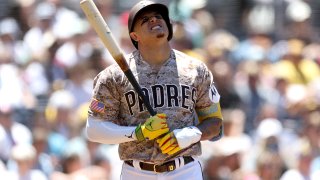 SAN DIEGO, CALIFORNIA – JUNE 25: Manny Machado #13 of the San Diego Padres reacts after striking out during the second inning of a game against the Washington Nationalsat PETCO Park on June 25, 2023 in San Diego, California. (Photo by Sean M. Haffey/Getty Images)