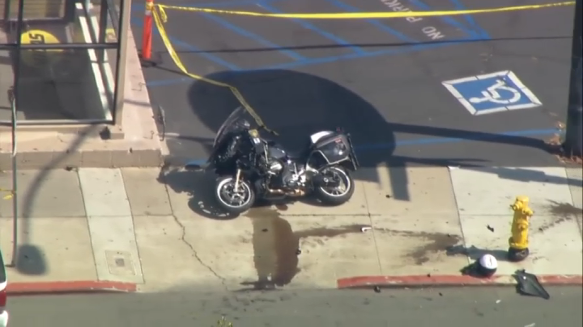Motorcycle officer suffered serious injuries in collision with SUV in Motorcycle officer suffered serious injuries in collision with SUV in