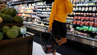 A shopper makes their way through a grocery store on July 12, 2023 in Miami, Florida. The U.S. consumer price index report showed that inflation fell to its lowest annual rate in more than two years during June. (Photo by Joe Raedle/Getty Images)