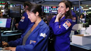 Traders work on the floor of the New York Stock Exchange (NYSE) in New York City, July 20, 2023.