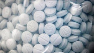 A bag of evidence containing the synthetic opioid fentanyl disguised as Oxycodone is shown during a press conference led by U.S. Attorney McGregor W. Scott at the Fresno County Sheriffâs Office on Aug. 19, 2020. (Craig Kohlruss/Fresno Bee/Tribune News Service via Getty Images)