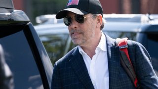 Hunter Biden walks to a waiting SUV after arriving with US President Joe Biden on Marine One at Fort McNair in Washington, DC, July 4, 2023.