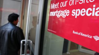 A man enters a Bank of America branch in New York.