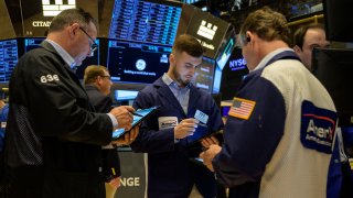 Traders work the floor of the New York Stock Exchange on July 25, 2023, in New York City. 