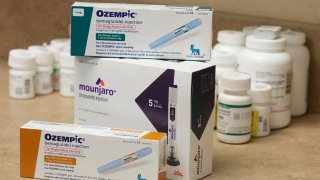A pharmacist displays boxes of Ozempic, a semaglutide injection drug used for treating type 2 diabetes made by Novo Nordisk, at Rock Canyon Pharmacy in Provo, Utah, U.S. March 29, 2023.